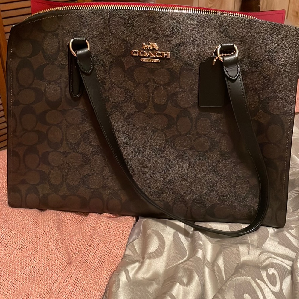 Coach Tatum Carryall 40 In Signature Canvas.  Like new condition.